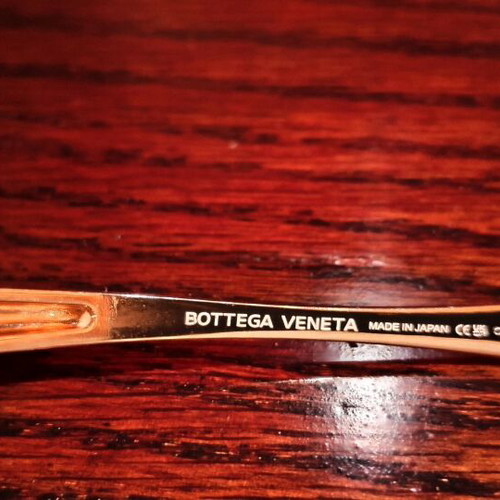 Bottega Veneta sunglasses like new, gold color