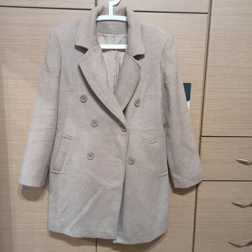 Beige coat size XL like new