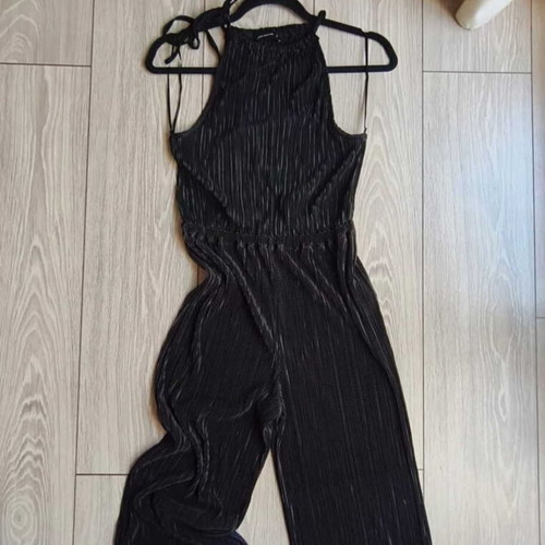 Pink Woman black halterneck jumpsuit size small like new