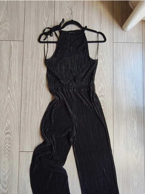Pink Woman black halterneck jumpsuit size small like new
