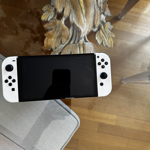 Nintendo OLED Edition конзола като нова с 5 игри и калъф за носене