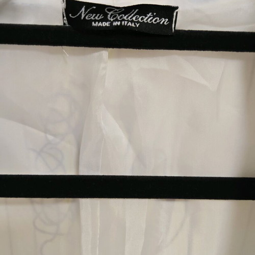 White blazer with designs used, relaxed fit, sizes M-L