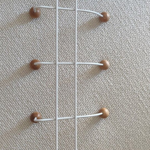 Metal coat rack used white with wooden ends and 10 hooks