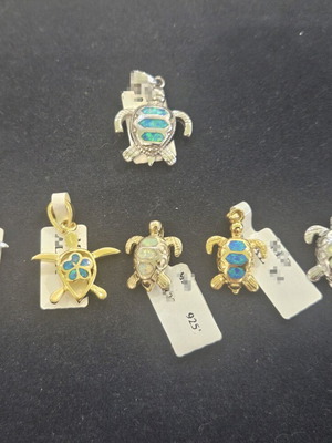 Silver 925 turtle pendant with synthetic blue and white opal