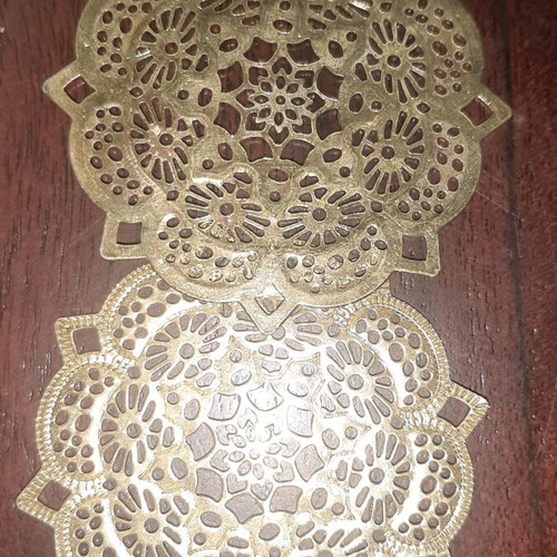 Large boho earrings used, gold color