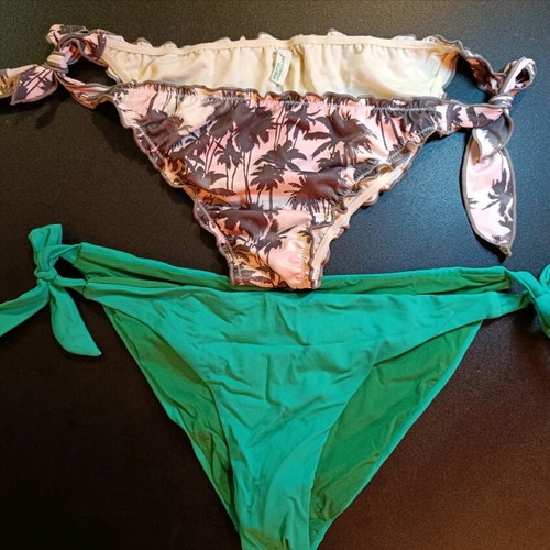 Benetton swimwear size M like new, two colorful and green pieces