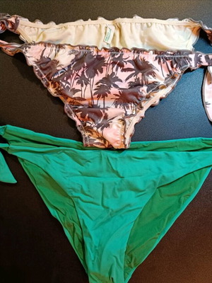 Benetton swimwear size M like new, two colorful and green pieces