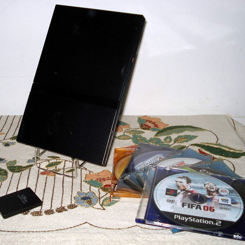 Sony PlayStation 2 Slim SCPH-70004 console bundle with controller and games
