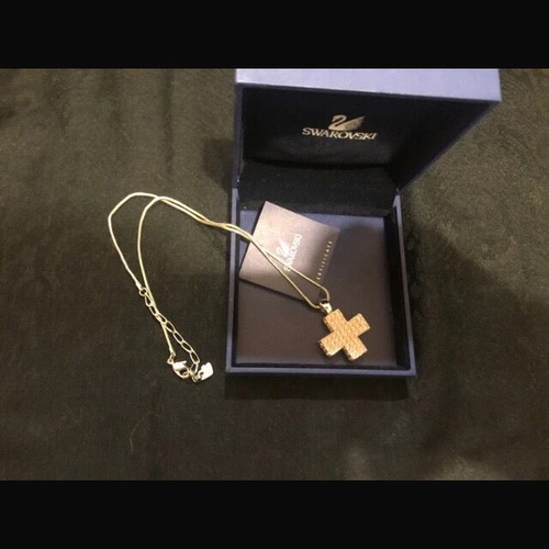 Swarovski pink cross necklace like new with crystals