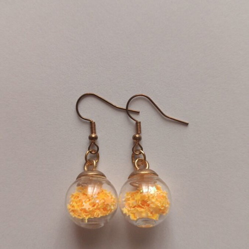 Earrings balls with orange stars new, gold-colored