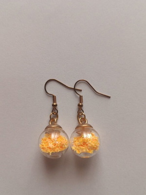 Earrings balls with orange stars new, gold-colored