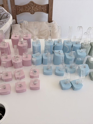 Wooden watch display stands used, set of 42 pieces with plastic clips