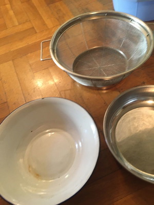 Kitchen items used, tupperware, strainer, basin