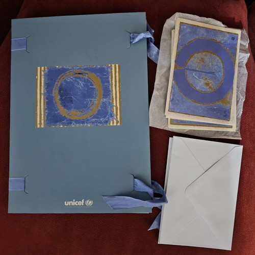 Vintage UNICEF collectible set with dossier and 6 cards