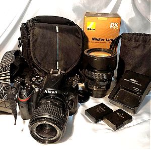 Nikon D5200, Two lenses (18-24mm 18-70mm), charger, two batteries and case