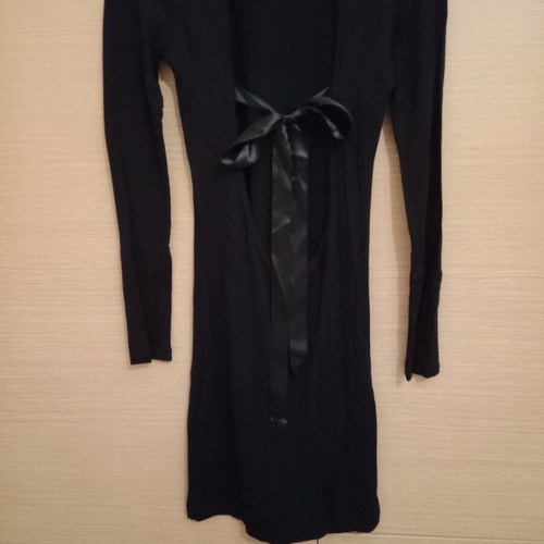 Black turtleneck dress with open back like new, fitted