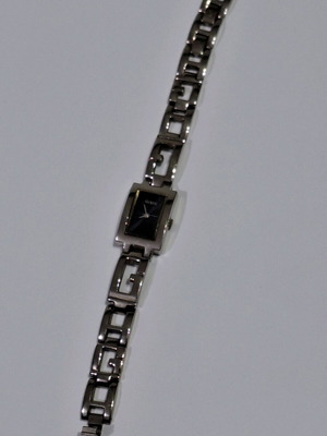 Guess women's thin silver watch used