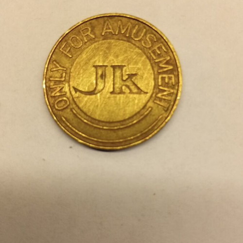 Brass amusement token used