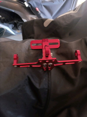 Adjustable motorcycle license plate holder like new, red