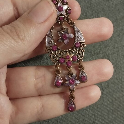 Vintage clip-on chandelier earrings with fuchsia rhinestones and bronze details
