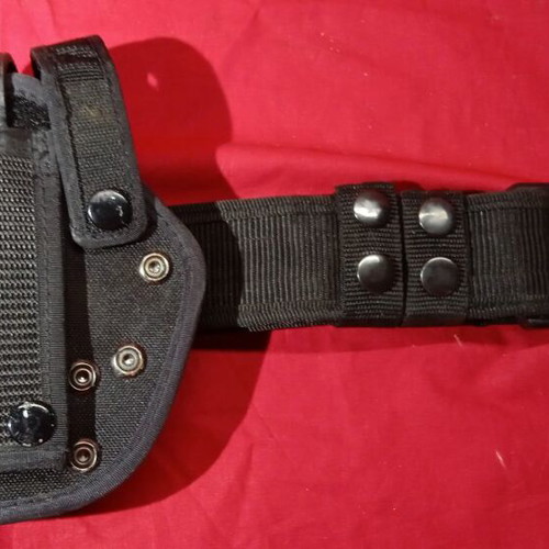 Tactical belt used, black cordura with quick-release buckle and holsters