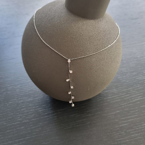 Necklace with hanging chain and stones