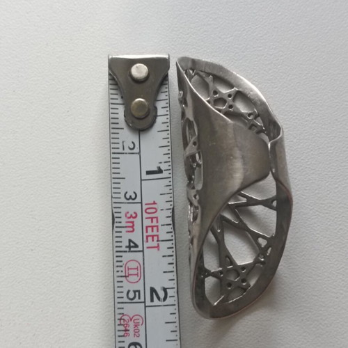 Long ring with adjustable opening like new