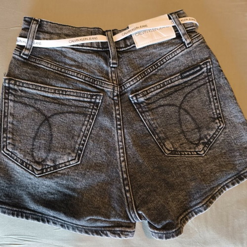 Calvin Klein denim shorts used, size 24