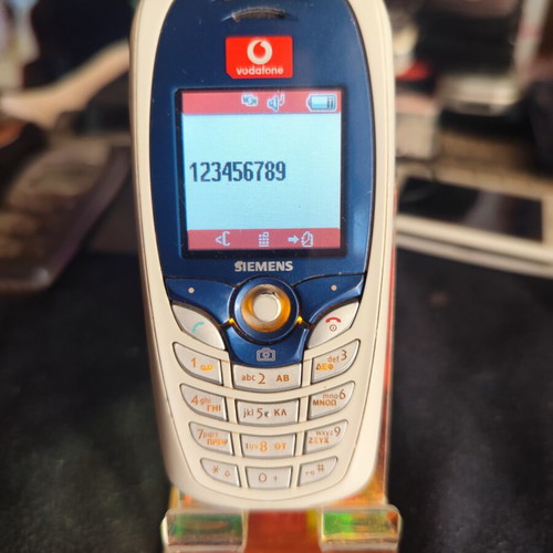 Siemens C65 mobile phone used, some keys not working, no charger