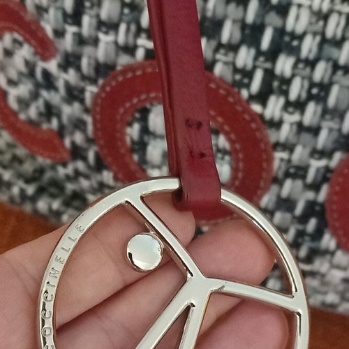 Coccinelle knitted shoulder bag like new with leather details