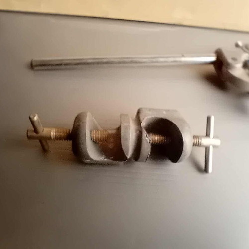 Old laboratory tools used for holding test tubes and bottles