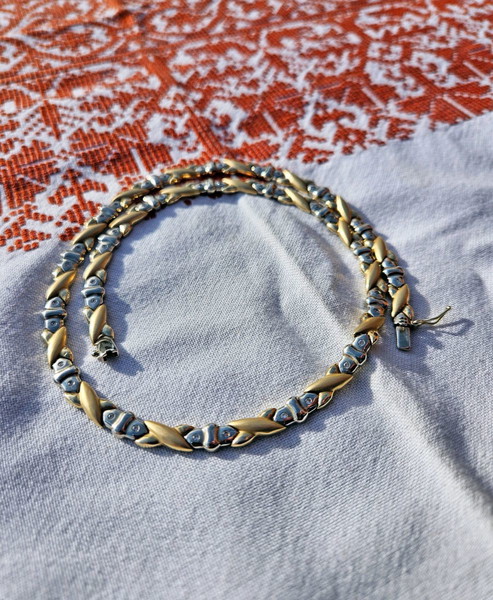 Златно колие 14ct с циркон, 33.8гр., отвор 19см, дебелина 4-12мм.