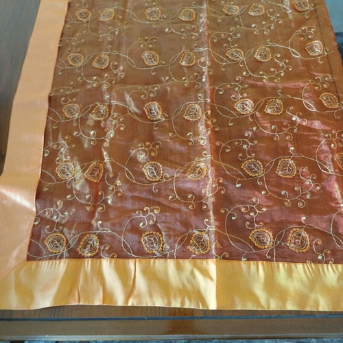 Embroideries used, runner and squares with orange tassels