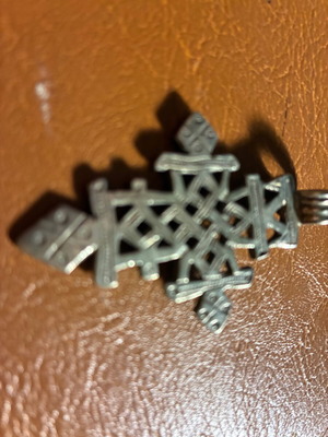 Cross pendant used with Ethiopian geometric design