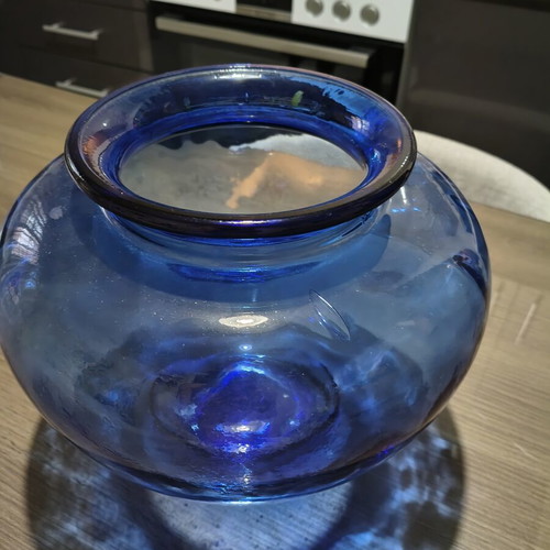 Blue glass vase, deep color and wide round shape
