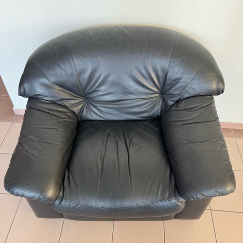 Black leather armchair used, synthetic leather