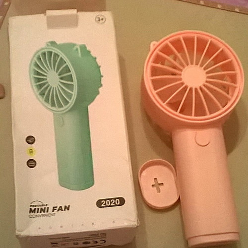 Pink Mini Fan like new with stable base, battery operated