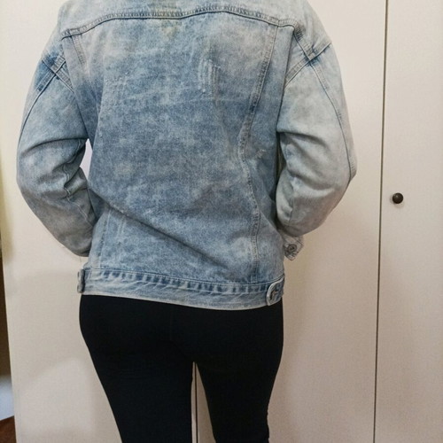 Denim jacket like new with rips, pearls and rhinestones