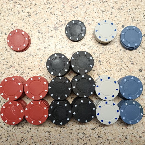 Poker chips used, set of 155 in red, black, white, and blue
