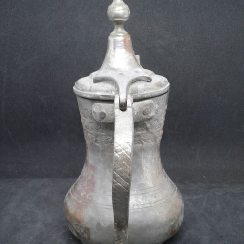 Antique copper coffee kanati used with engraved oriental designs