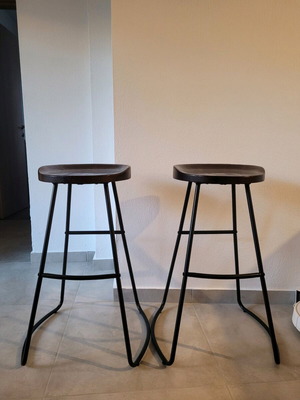 Wooden stool with black base like new