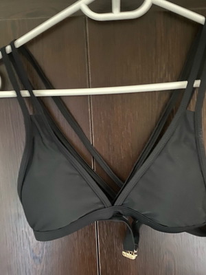 Black bikini top new with crisscross straps, size XS