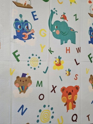 Children's play mat with animal and alphabet design