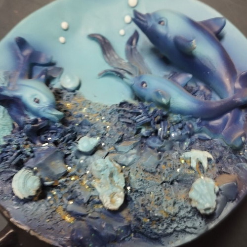 Decorative plate used with dolphins