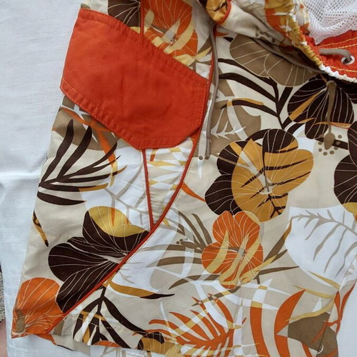Men's swim shorts like new, printed earth tones, size L