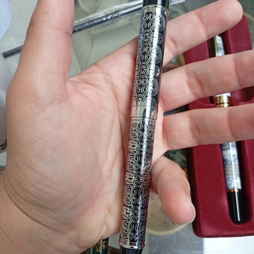 Pens in like-new condition with various designs