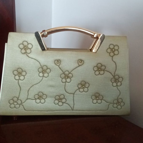 Small gold handbag with handle and long chain, like new