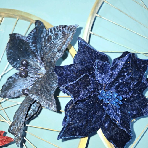 Christmas flowers used, dark blue decorations
