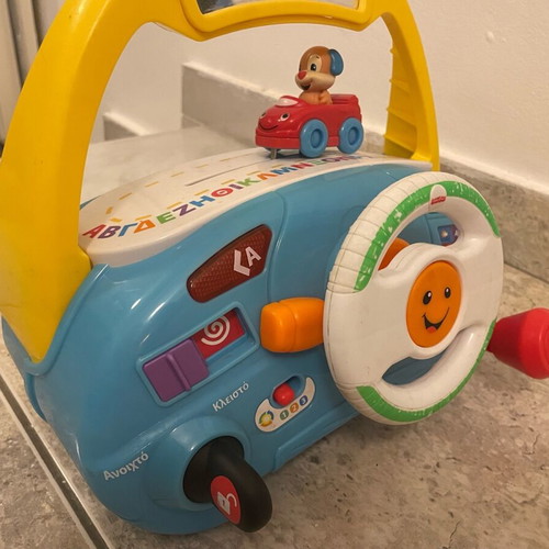 Fisher Price driving toy used with sounds and activities