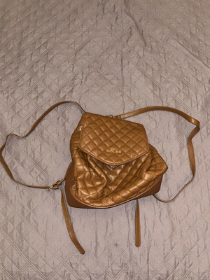 Nolah brown quilted backpack like new with magnetic closure